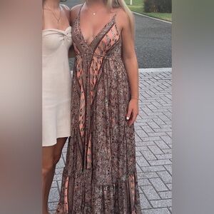 Elegant Brown Patterned Maxi Dress with gold accents